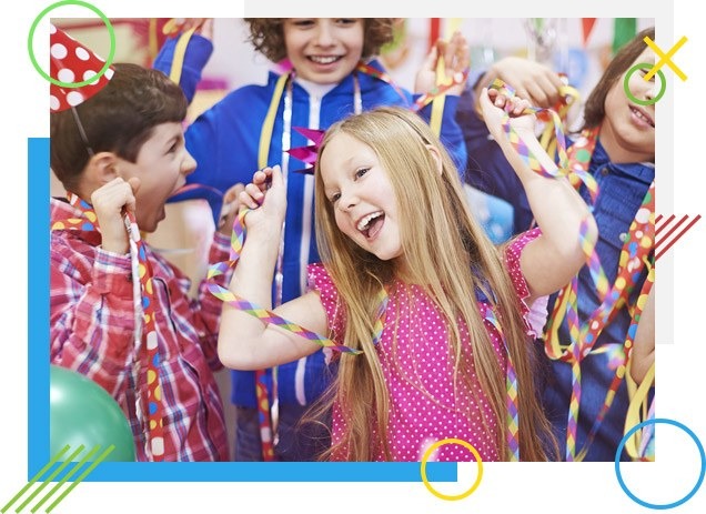Smiling children playing with colorful ribbons at a kids’ party – Mini Marvels Emporium, baby and kids store in UAE