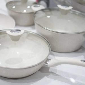 Medium 24cm black/grey marble-coated non-stick frying pan with a rugged forged aluminum base.